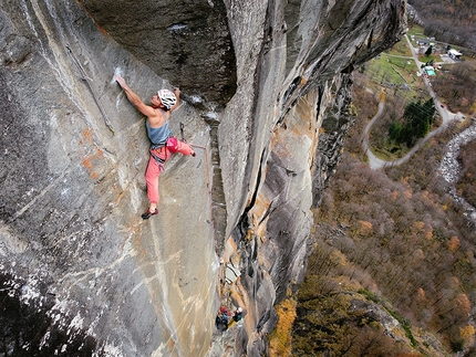 Val Bavona, Alexandra Schweikart, Christopher Igel - Alexandra Schweikart on the 8a+ crux pitch of Space Force in Val Bavona, Switzerland