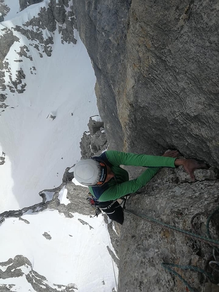 Civetta, Dolomites, Torre d’Alleghe, Nicola Tondini, Lorenzo D'Addario - Lorenzo D'Addario climbing the crux pitch of Dulcis in fundo up Torre d’Alleghe in Civetta, Dolomites