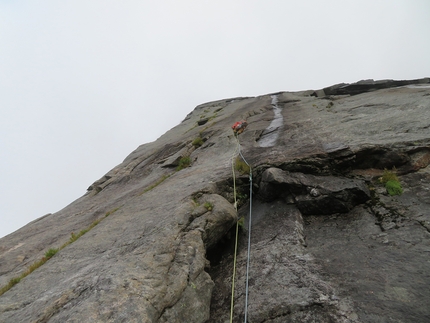 Lofoten, rock climbing, Moskensøya, Storskiva, Ørneeggen, Juho Knuuttila, Misha Mishin - Misha Mishin high on Ørneeggen, West Face of Mt. Storskiva on the island of Moskensøya off the Lofoten islands in Norway.