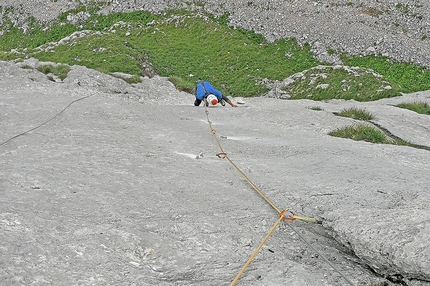 Bepino, Cima Uomo, Brenta Dolomites, Rolando Larcher, Michele Cagol - Michele Cagol climbing pitch 2 of Bepino on Cima Uomo (Brenta Dolomites)