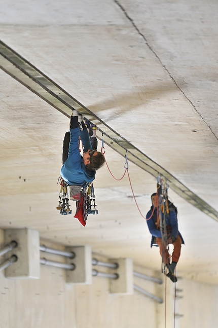 Tom Randall, Pete Whittaker, motorway bridge  - Tom Randall and Pete Whittaker climbing The Great Rift below the M5 and above River Exe, UK. 'The bridge does actively contract and expand during the climbing and belays so it does take a while to get used to it and not freak out!'