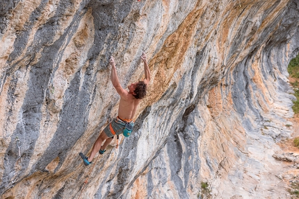 Alexander Rohr, Oblivion, Gimmelwald, Switzerland - Alex Rohr making the first ascent of Oblivion 9a at Gimmelwald in Switzerland