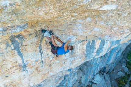 Chris Frick (54) climbs Stop Sika (8c) at Rawyl, Switzerland