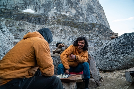 Vampire Spires, Canada, Sebastian Pelletti, Michael Pedreros, Hernan Rodriguez Salas, Pato Diaz - Hernan Rodriguez Salas and Michael Pedreros play chess at their base camp below the Vampire Spires, Canada