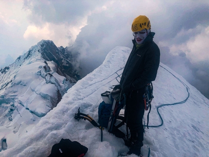 Lasunayoc, Peru, Cordillera Vilcabamba, Nathan Heald, Leo Rasalio - Nathan Heald on the summit of Nevado Lasunayoc (5,936m), Peru, after having climbed a new route on the mountain's SE Face to E Face