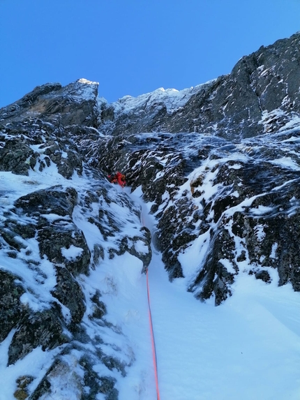 Grytetippen, Senja, Norway, Fay Manners, Freja Shannon - Making the first ascent of 'How not to' (M5, 250m) on the north face of Grytetippen, Senja island, Norway (Fay Manners, Freja Shannon 03/2023)