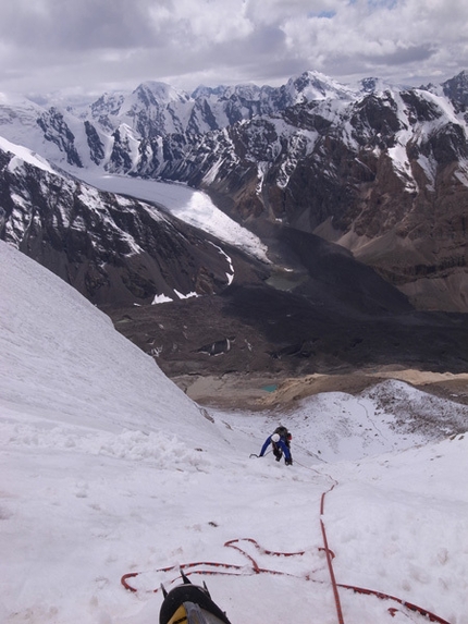 Kyrgyzstan - Jim Broomhead down climbing on Peak Lea shortly before getting hit by avalanches.