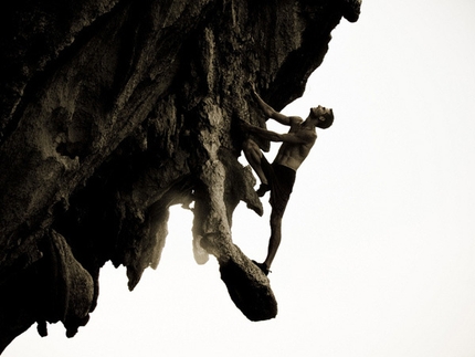 Vietnam Psicobloc - Surveying the route ahead on an unknown wall in Ha Long Bay