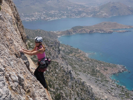 Wild Country Telendos - Wild Country: Monica Sancho raeching the top of the route © Keller / Odermatt