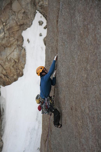 Greenland - Michi Wyser during the first ascent of Serratit, Quvnerit Island, Greenland